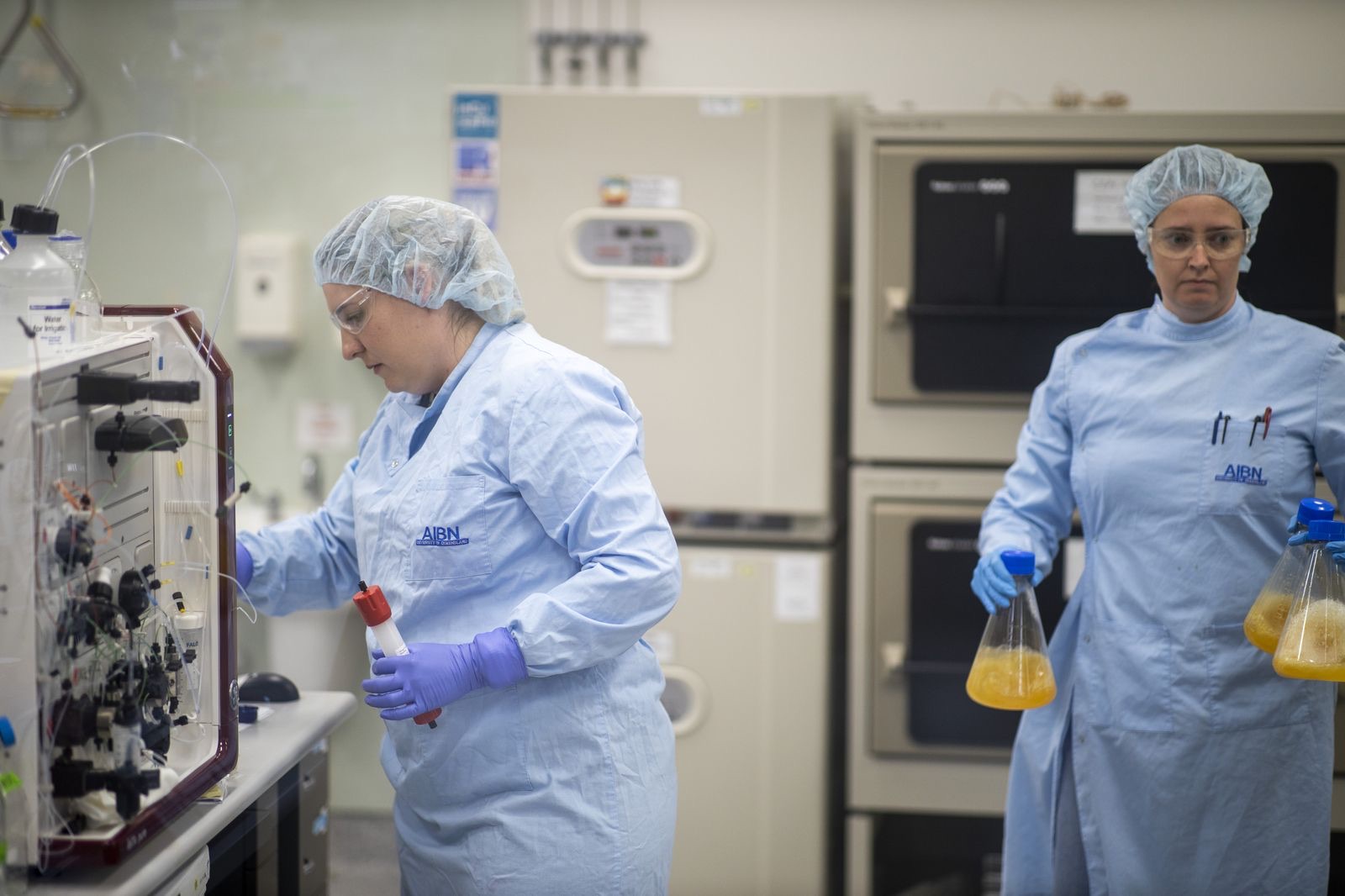 Researcher operating a chromatography purification system